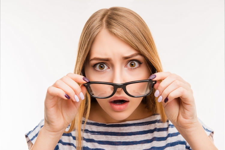 A woman acts surprised
